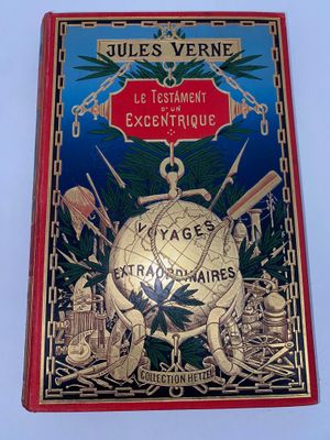 an old book with a picture of a globe surrounded by other objects
