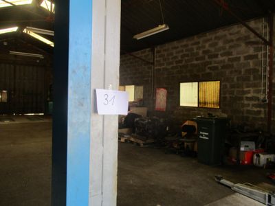 a sign on the door of a building that says no smoking