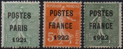 four different postages with different colors and designs on them