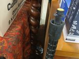 a table with a guitar on it next to a chair