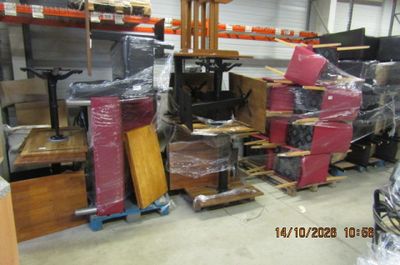 a lot of boxes that are stacked up in a warehouse