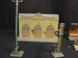 a small model of a building with a street light on it