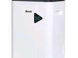 a white and black air purifier on a white background