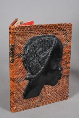 a book with a picture of a woman wearing a hat on it