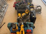 a lot of tools that are sitting on the floor
