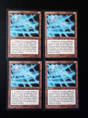 quatre cartes ornées de motifs bleus et noirs