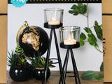 deux bougies posées sur une table