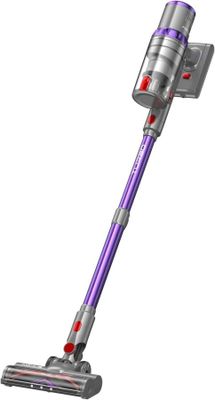 un aspirateur violet et argenté est posé sur une surface blanche