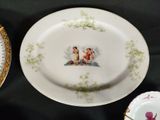 a plate with a picture of a boy and a girl on it