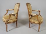 pair of louis xvi style armchairs