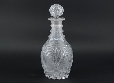 an image of a clear glass bottle on a black background
