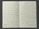 an open notebook with a handwritten poem on it
