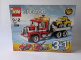 a box of lego creators on a white surface