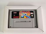 a nintendo game in a white box on the wall