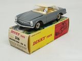 a toy car that is sitting on top of a box