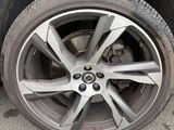 a close up of a tire on a car ' s rim