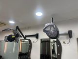 a photo of a hair salon with mirrors and lights