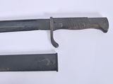 two knives that are sitting next to each other on a table