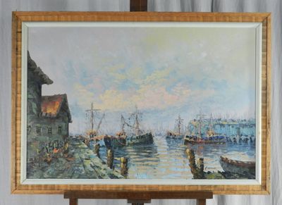 une photo d'un tableau posé sur un chevalet au bord de l'eau