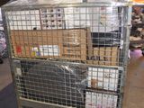 a large metal cage with a bunch of boxes in it