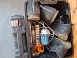 a suitcase with a bunch of items inside of it