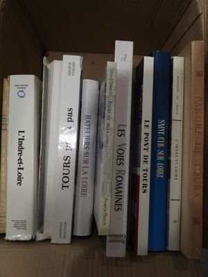 a box full of books that are sitting on a table