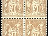 four different postage stamps with the image of a woman and a man