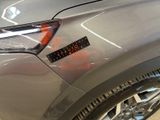 a close up of a car with a sticker on it