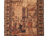 une vieille tapisserie sur laquelle sont représentés un homme et une femme