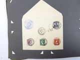 a piece of paper with stamps on it on a table