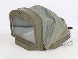 a bag that is sitting on top of a microwave oven
