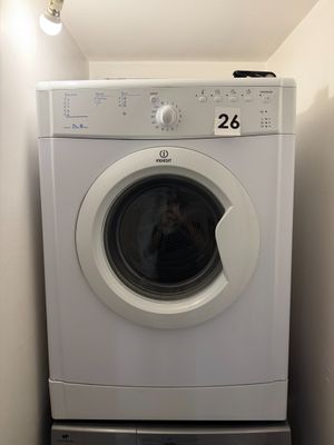 a washer and dryer in a small room
