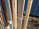 several pieces of wood are stacked on top of each other on the ground