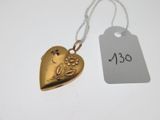 une image représentant un cadenas doré en forme de cœur avec une étiquette de prix