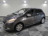 a picture of a gray car parked in a garage