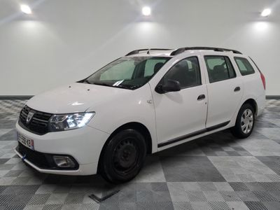 the white van is parked in a large room with a checkered floor