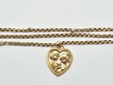 gold plated necklace with a heart pendant on a chain
