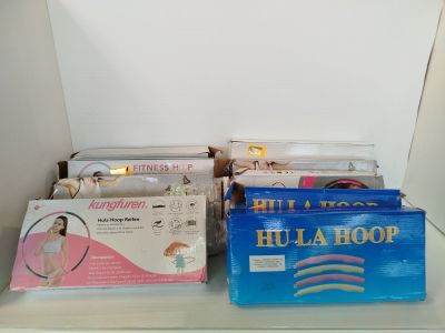 many different types of items on a shelf in a room
