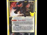 a close up of a pokemon card on a black background