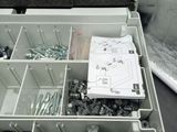 a box filled with assorted items sitting on a table
