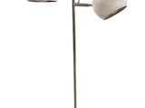 a white lamp that is on a metal pole