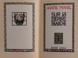 an open book with a picture of a dog and a picture of a cat