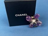 chanel flower brooch with amethorate