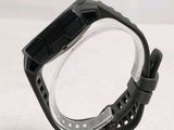 a close up of a watch on a plastic stand