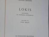 un livre blanc avec des inscriptions noires