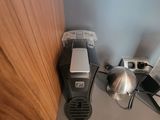an image of a coffee maker and other items on a table
