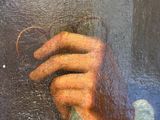 a painting of a person holding a ring in their hand