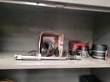 a shelf with a bunch of tools on top of it