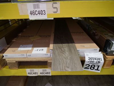 many boxes of wood on the shelves in the store