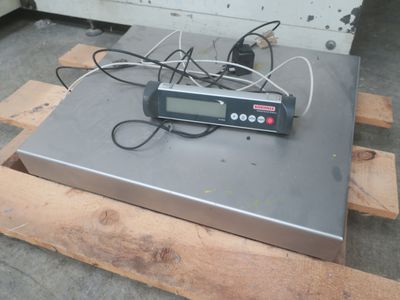 an image of a digital scale on a pallet